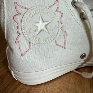Converse women’s White High-Top Sneakers